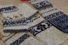 Various wrist warmers with Ruhnu patters